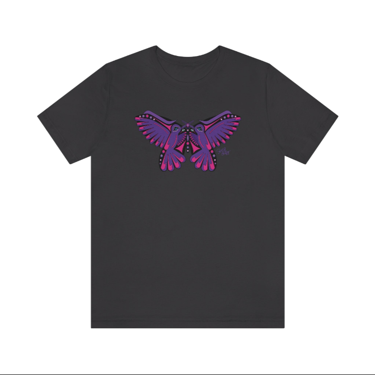 Close up detailed view of original Salish Grant Coast Salish art featuring hummingbird and purple butterfly printed on dark grey cotton t-shirt